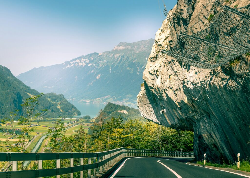 gray asphalt road under blue sky